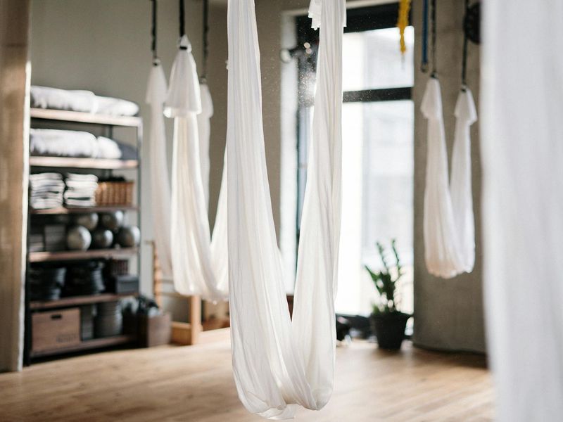 Detailed view of yoga equipment and a peaceful atmosphere.